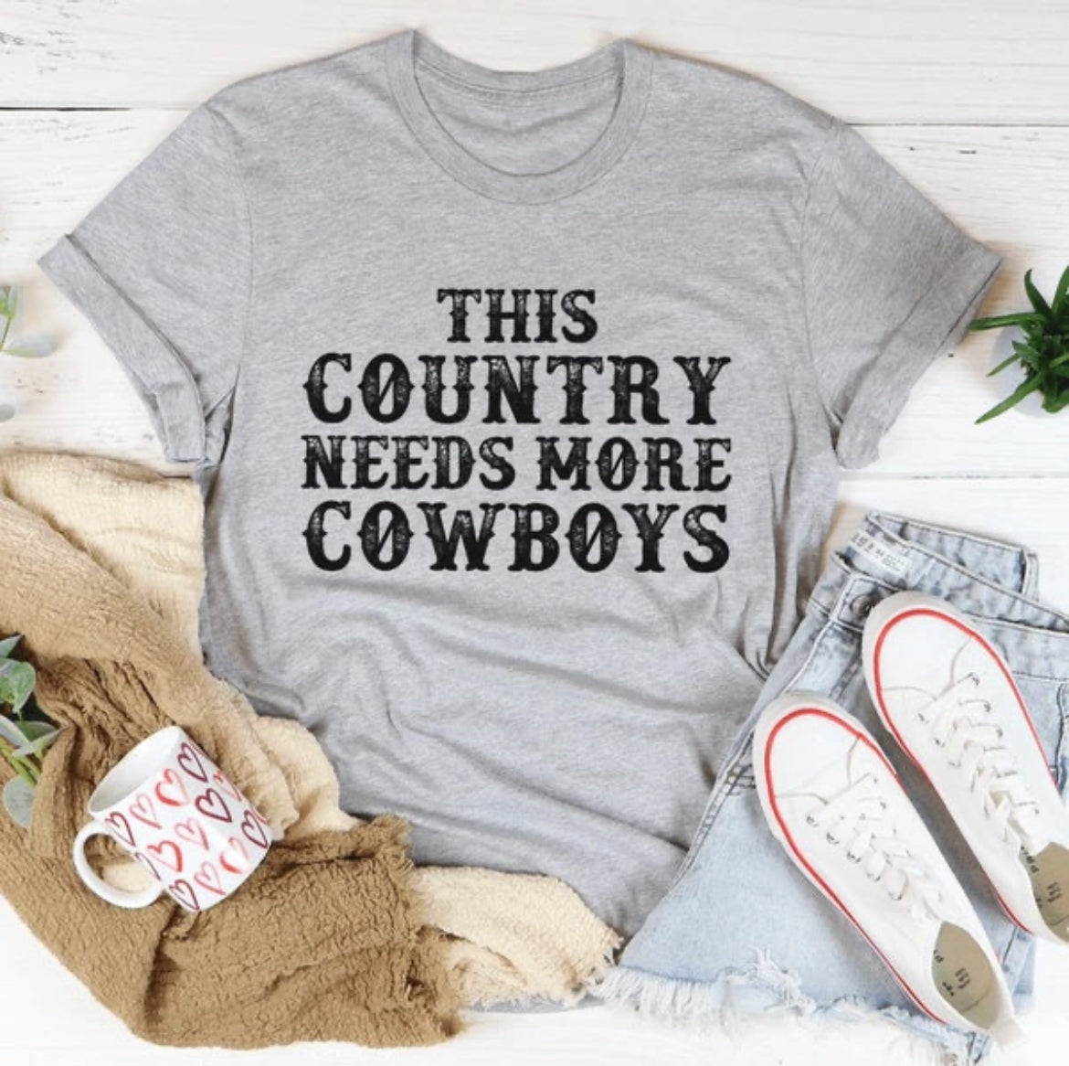 women’s This Country Needs More Cowboys Tee (Selected Colors)